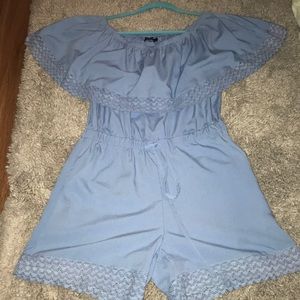 Off the shoulder blue romper.